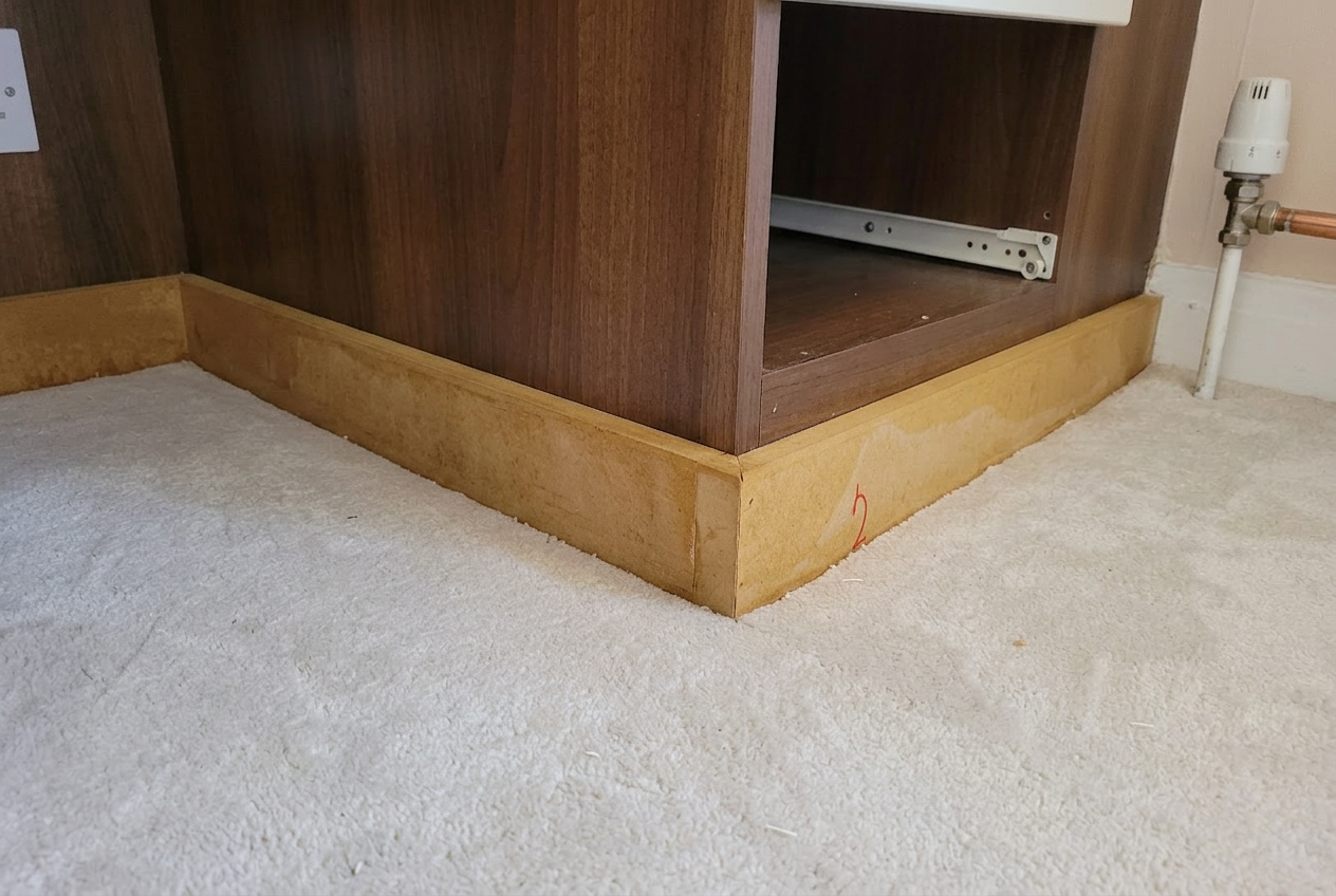 Skirting boards — walnut wrap — before